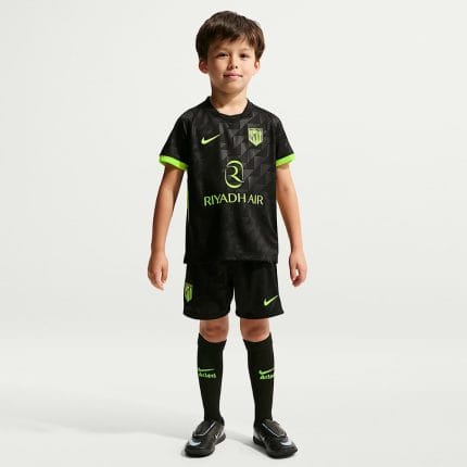 Segunda equipación del Atlético de Madrid 2027 para niños. Uniforme de visitante oficial para los jóvenes aficionados colchoneros.