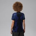 Vista frontal de la camiseta de mujer de la segunda equipación de Brasil 2026. Diseño oficial para aficionadas del equipo brasileño.