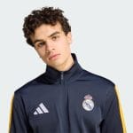 Chándal negro de entrenamiento del Real Madrid 2026 para adulto. Conjunto oficial de chaqueta y pantalón de la equipación de viaje.
