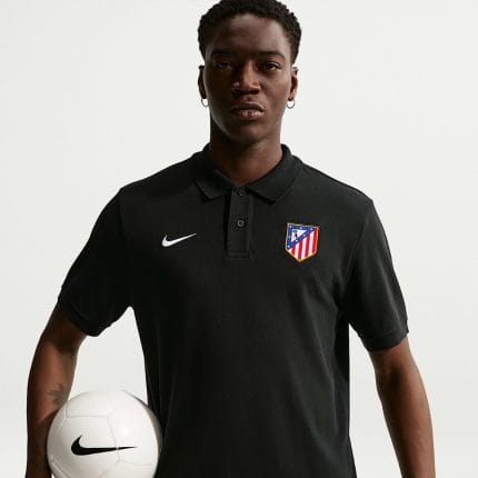 Polo oficial del Atlético de Madrid para adulto, temporada 2027. Ropa de paseo del club colchonero con el escudo bordado.