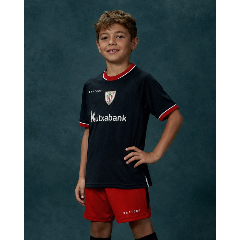 2ª Equipación At. Bilbao Niños 26/27 Segunda equipación oficial del Athletic Club de Bilbao para niños, temporada 2026-2027. Vista frontal de camiseta y pantalón.