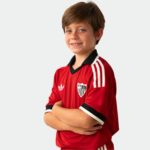 Segunda equipación oficial del Sevilla FC para niños, temporada 26/27. Camiseta de visitante para los más pequeños.