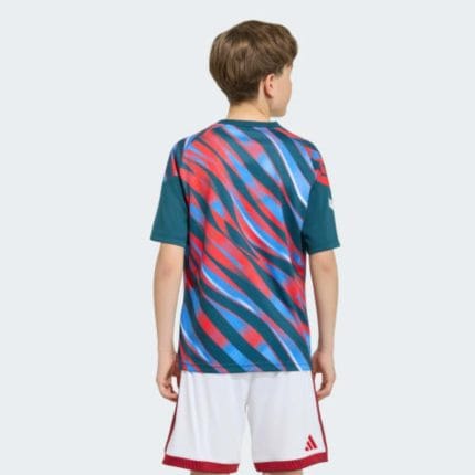 Camiseta de calentamiento para niños del Arsenal FC, temporada 26/27. Equipación prepartido oficial para los jóvenes gunners.