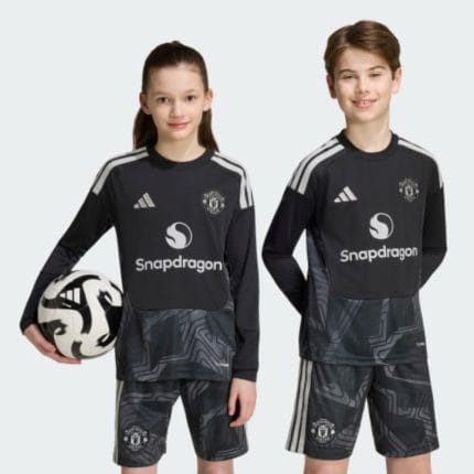 Camiseta de portero para niños del Manchester United temporada 26/27. Vista frontal de la equipación oficial para jóvenes.
