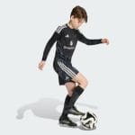 Camiseta de portero para niños del Manchester United temporada 26/27. Vista frontal de la equipación oficial para jóvenes.