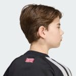 Camiseta de portero para niños del Manchester United temporada 26/27. Vista frontal de la equipación oficial para jóvenes.