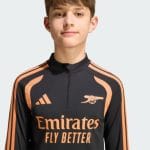 Camiseta de entrenamiento del Arsenal FC para niños, temporada 26/27. Ropa oficial de práctica para los jóvenes seguidores Gunners.