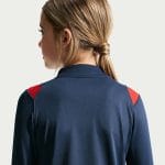 Imagen de la camiseta de entrenamiento del PSG para niños, temporada 26/27. Equipación oficial de fútbol para jóvenes aficionados.