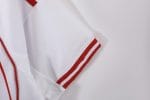 Camiseta retro Arsenal 1988 estilo béisbol, blanca con rayas rojas, logo Adidas moderno y escudo 'A' fantasía. — foto 12