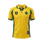 Camiseta retro Camerún 1998/99 segunda equipación amarilla y verde. — vista frontal en maniquí