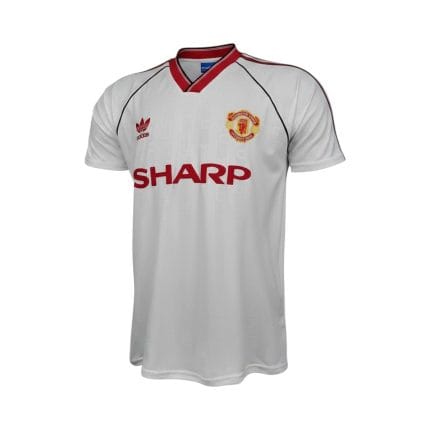 Camiseta retro del Manchester United, segunda equipación de las temporadas 1988/90, color blanco con detalles rojos. — vista frontal en maniquí
