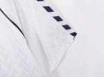Camiseta retro Real Madrid 1986/87 primera equipación, blanca con detalles morados y sponsor Parmalat. — foto 7