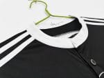 Camiseta retro Real Madrid 2014/15 tercera equipación negra con diseño de dragón. — foto 9