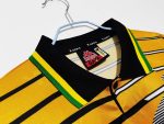 Camiseta retro de fútbol de Sudáfrica, primera equipación de la temporada 1994, marca Kappa, diseño amarillo, negro y blanco. — foto 8