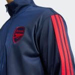 Chándal oficial de entrenamiento del Arsenal FC para la temporada 26/27. Conjunto completo de chaqueta y pantalón para adulto.