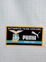 Camiseta retro Lazio 1999/00 tercera equipación blanca con detalles celestes y amarillos. — foto 2
