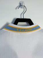 Camiseta retro Lazio 1999/00 tercera equipación blanca con detalles celestes y amarillos. — foto 6
