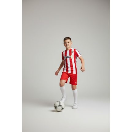 Equipación primera UD Almería para niño temporada 2026/27. Camiseta y pantalón rojiblancos oficiales del club.