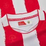 Equipación primera UD Almería para niño temporada 2026/27. Camiseta y pantalón rojiblancos oficiales del club.