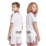 Primera equipación de fútbol del Albacete para niños, temporada 26/27. Conjunto oficial de camiseta y pantalón para jóvenes fans.